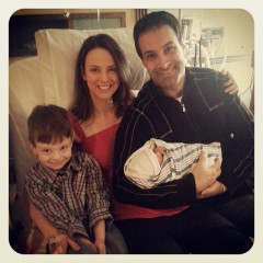 Family of four in the delivery room